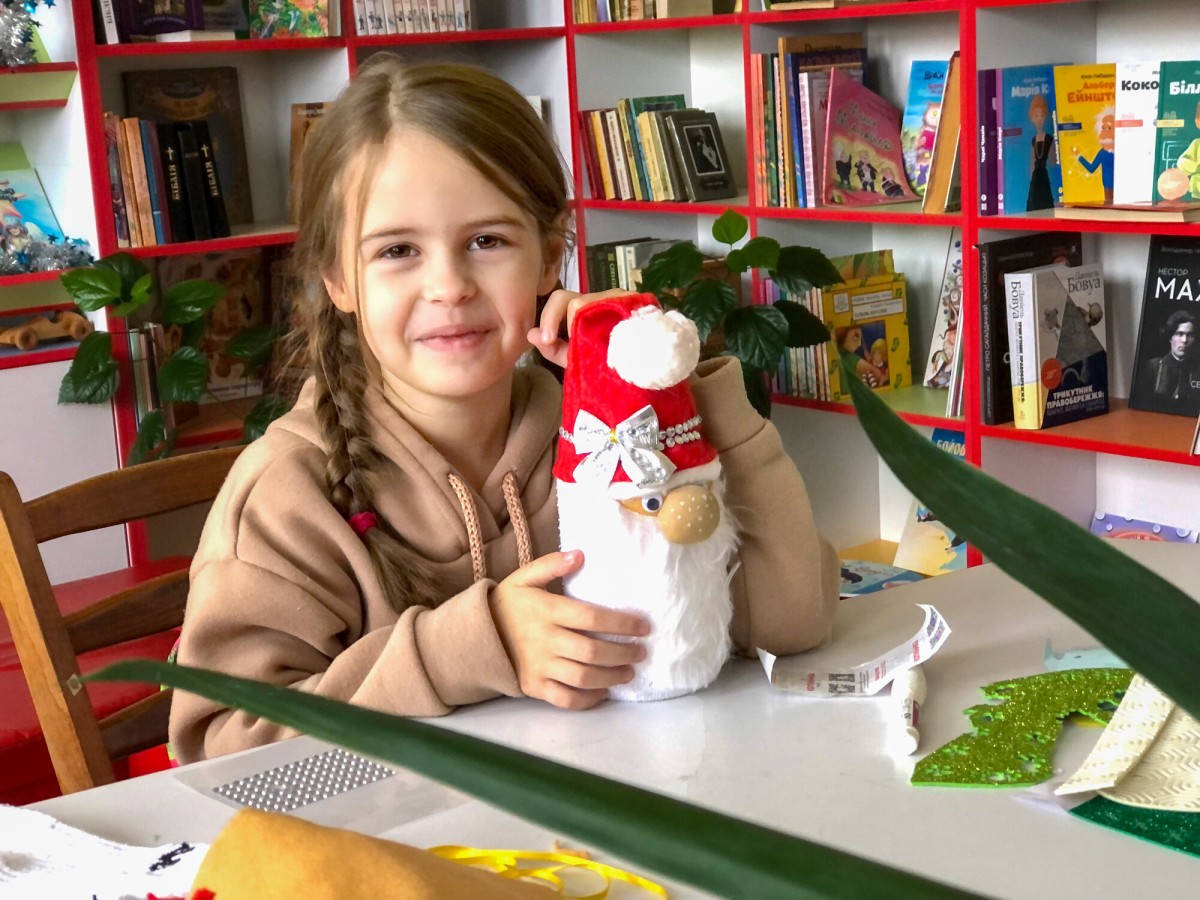 christmas ukraine a child holding a noel